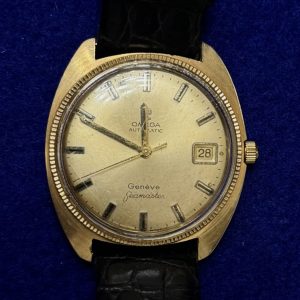RELOJ OMEGA AUTOMÁTICO AÑOS 70. DE ORO 18KTS Y PULSERA DE PIEL.