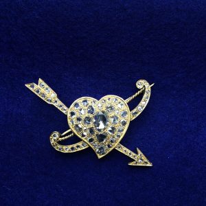 Broches corazón forma cupido con diamantes 2,5 cts montado en oro amarillo de ley 18kts