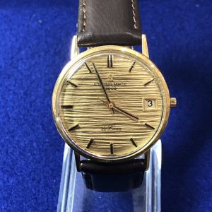 Reloj Eternamatic 3003 de Luxe, automático, con esfera dorada texturizada realizado en oro amarillo de ley 18 kts
